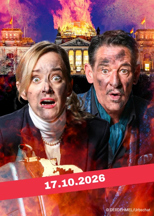Zwei Personen mit rußverschmierten Gesichtern und erschrockenen